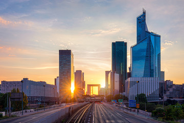 Obraz premium La Defense Financial District Paris France at sunset. Skyscrapers of Defense modern business and financial district in Paris with high-rise buildings and convention center. La Defense business area.