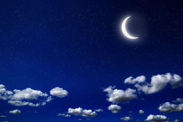 Naklejka na ściany i meble Moon in cloudy night with alot of stars and dark blue sky background