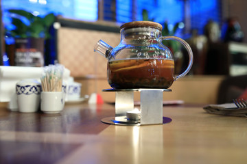 Glass teapot with tea