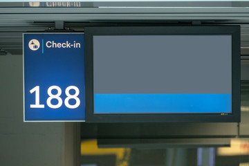 Empty screen at check in desk at airport