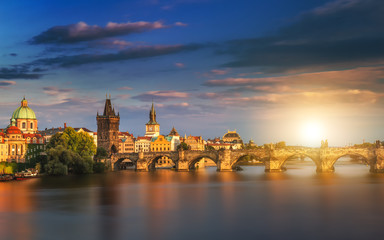 Prague, Czech Republic panorama with historic Charles Bridge and Vltava river on sunny day.