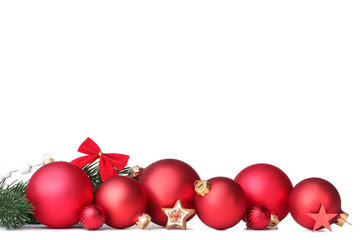 Christmas balls with fir tree branches isolated on white background