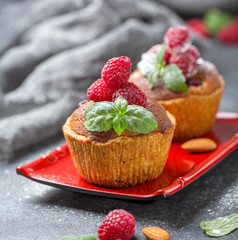 Tartlets with red raspberries and frangipani.