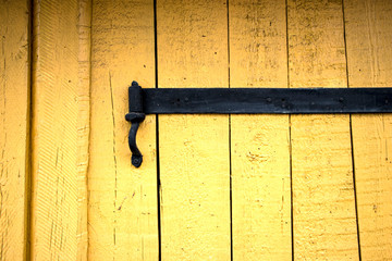 Old wooden boards with peeling paint. Old background. Textured planks of oak and pine. Bright colours. Natural aging of the material.
