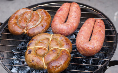 fried sausage on the grill