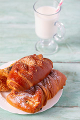 fresh buns and glass of milk