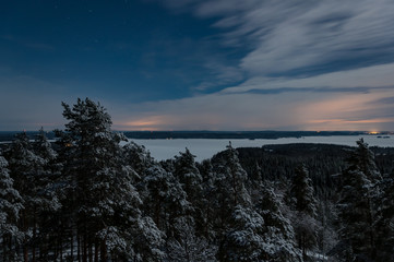 Snowy forests and a frozen lake in Finland