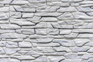 Texture of the facade stone for the exterior decoration of the house.