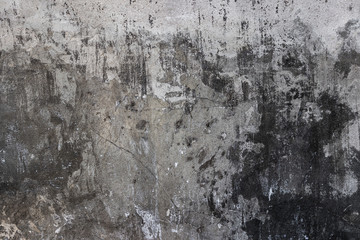 Old cement wall texture fragment with spots and scratches as abstract background composition