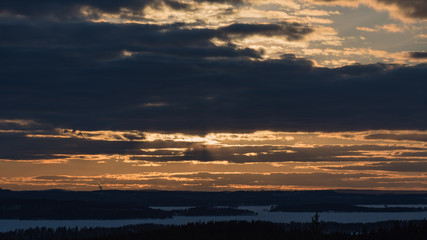 Winter forest landscape in sunset time in Finland