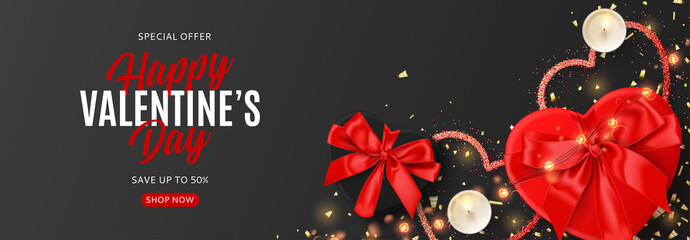 Fototapeta na wymiar Valentine's Day sale promo web banner. Vector illustration with realistic red and black gift boxes, sparkling light garland, candles and confetti on black background. Promo discount banner.