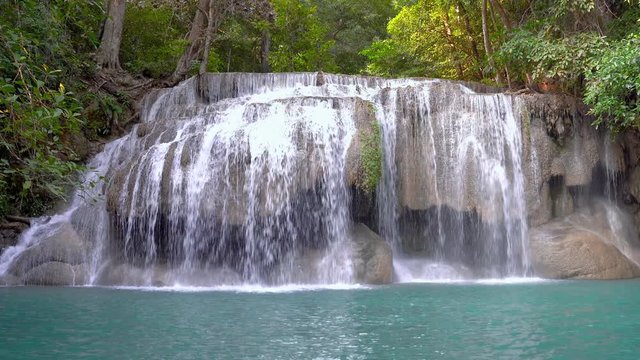 zoom in video of Erawan water fall (Second floor), tropical rainforest at Srinakarin Dam, Kanchanaburi, Thailand. Beautiful waterfall in Thailand. 