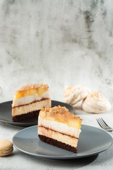 pear chocolate cake on gray plate on marble background. Selective focus. Vertical photo. Menu for bakery. cafe menu. Pastry. Delicious and sweet dessert at cafe restaurant.