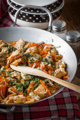 Fried chicken pieces with vegetables.