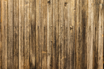 Fototapeta premium Old gloomy planks nailed with rusty nails