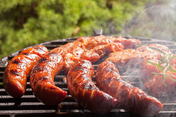 Fototapeta premium Grilling sausages.