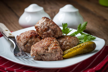 Meatball with parsley.
