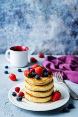 pancakes with strawberries, blueberries and raspberries