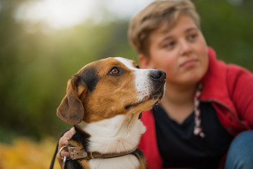 Boy with a mixed breed dog