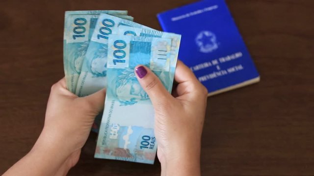 female hand counting Real banknotes