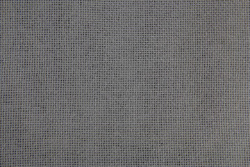 Fabric texture close-up. Grey cloth. Natural fabric.