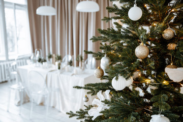 Christmas tree and decor on the background of the room. Blurred background