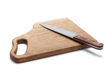 Kitchen Knife Lying On A Cutting Board, White Background