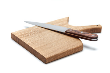 Kitchen Knife Lying On A Cutting Board, White Background