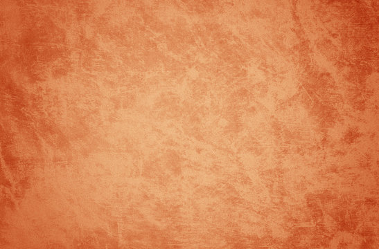 copper orange background paper texture grunge with faded scratched grungy pattern in old distressed vintage template for halloween thanksgiving or autumn designs