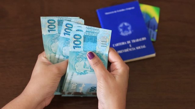 female hand counting Real banknotes