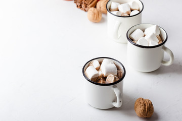 Hot chocolate, cocoa  on the festive white wooden table