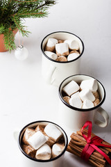 Fototapeta na wymiar Hot chocolate, cocoa on the festive white wooden table