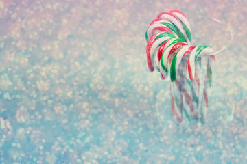 Candy canes with red white and green stripes