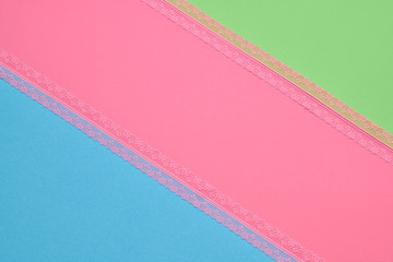 Fashion Coloful pink green blue background with lace. Minimal. Trendy spring summer color. Creative vibrant pop art fashionable concept.