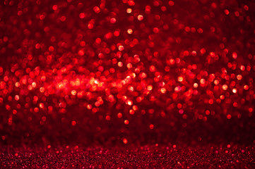 Abstract bokeh red and burgundy color circular background. Christmas light or season greeting...