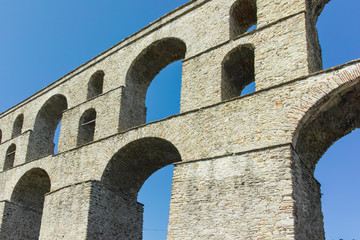 Fototapeta na wymiar Old aqueduct in city of Kavala, Greece