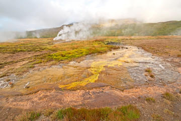 Steam and Colorful Bacteria at a Thermal Area
