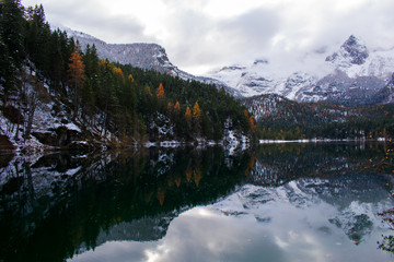 In the Lake of Tovel the snowy Alps are mirrored, Trentino Italy