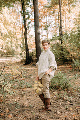 Fototapeta premium autumn yellow leaf fall conceptual girl park