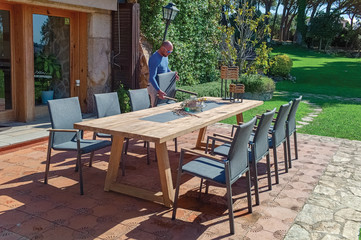 dining table with chairs in the garden 