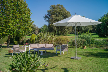 furniture for relaxing in the garden. set of sofa, armchairs and coffee table © alex_dancer