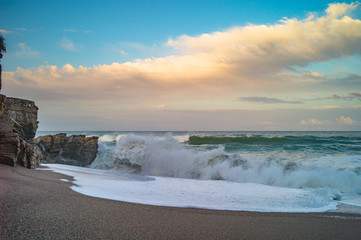 Naklejka na ściany i meble storm in the mediterranean sea at sunset