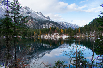 Fototapeta premium A wonderful view of Lake Tovel in Trentino with the first snow