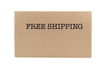 the side of the cardboard box with inscription free shipping isolated on white background, delivery concept, mock up, copyspace