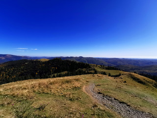Fototapeta premium Path in the mountains leading to the peak