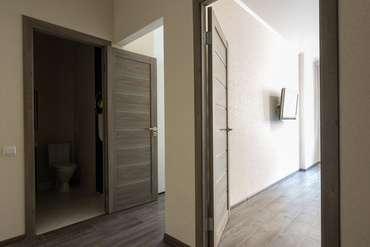 Corridor in a small apartment, open doors