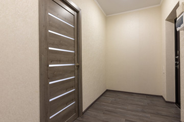 Empty corridor in the apartment at the front door