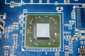 a chip in a computer with many electrical elements, a CPU, a GPU, a microchip in an electronic device, a multi-core multithreaded processor crystal, close up, macro