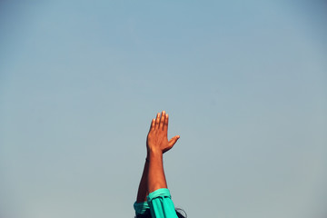 Closeup of human hand doing yoga
