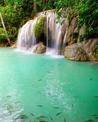 Fototapeta na wymiar Beautiful Erawan Waterfall in Thailand